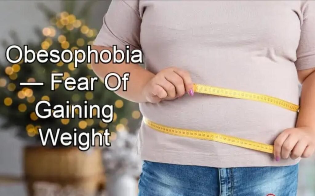 What causes people to develop obesophobia?
